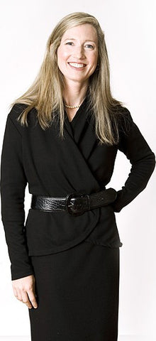 Alison wears the Signature Jacket belted over the Signature Dress for a pump-friendly suit at the office. 