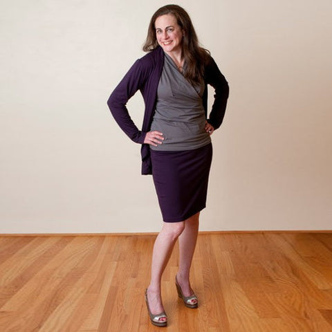 Holli wears the Crocus Jet Set Skirt with the coordinating Jet Set Jacket and a Pewter Crossover Shirt.