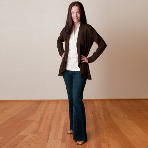 Ophelia pairs the Jet Set Jacket and Ivory Crossover Shirt with her own jeans.