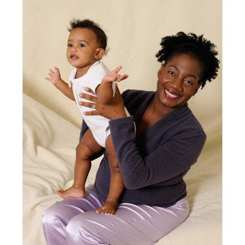 Teri wears the coordinating Violet fleece top with the Lavender pajama pants at night for a warm co-sleeping outfit.