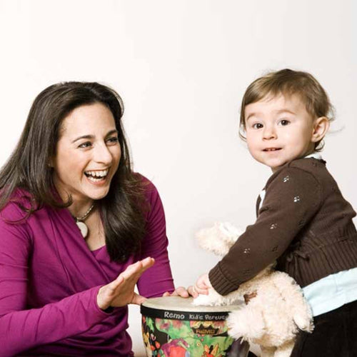 Holli likes to pair her HadleyStilwell Fuchsia Crossover Shirt with black or gray wardrobe staples. 