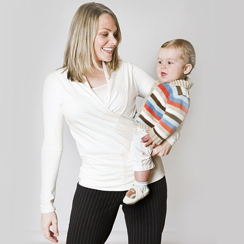 Jaana paired the Ivory Crossover Shirt with her gray pin-striped trousers for stylish but pump-friendly work outfit. This shirt can also be worn tucked in.