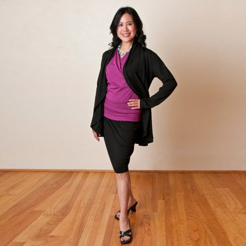 Colleen wears the Fuchsia Sleeveless Crossover Shirt with the Onyx Jet Set.