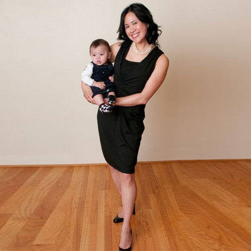 Colleen wears the Onyx Jet Set Dress alone for warm weather chic.