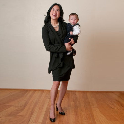 Colleen ties the sash over the Onyx Jet Set Jacket and Dress for a suit.