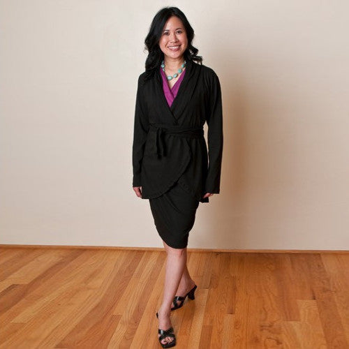 Colleen wears the Onyx Jet Set Skirt and Jacket belted over the Fuchsia Crossover Shirt.