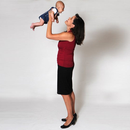 Christine wears her HadleyStilwell Cranberry Sleeveless Crossover with the Black Signature Skirt . She could add the Signature Jacket or Blazer to make a suit.